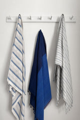 Home & Loft blue-ivory-montauk-towel with light blue cape and blue agean towels
