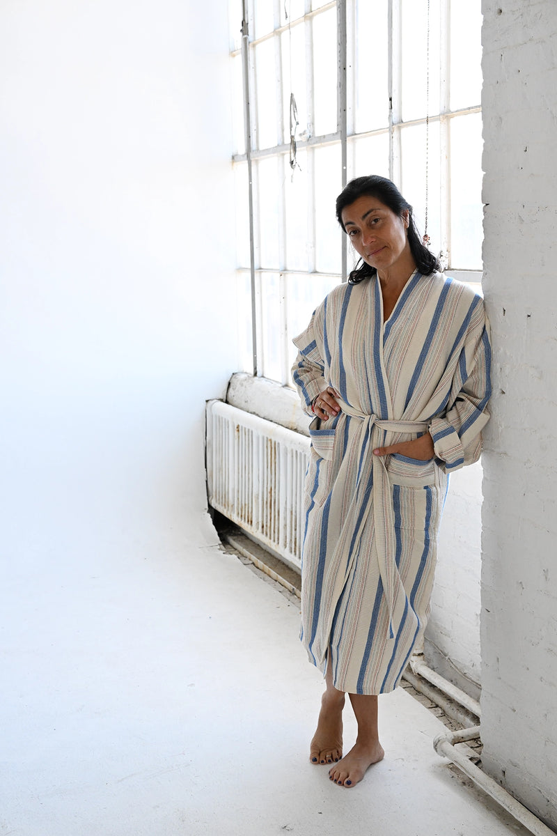 blue-ivory-Montauk-long-robe home & loft bathrobe in turkish cotton striped linen with model

