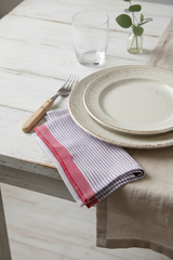 Home & Loft Rosewood turkish cotton napkin at a table setting of a coastal farmhouse style home